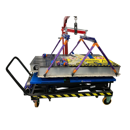A battery lifting hoist being used in conjuction with a sykes pickavant battery lifting table and an engine crane