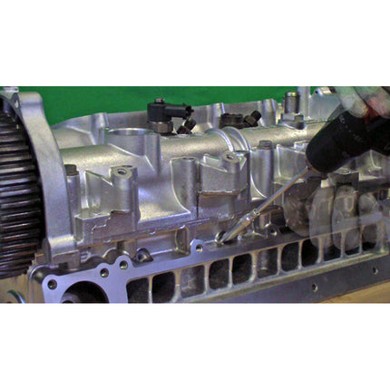 action shot of glowplug removal tool in use